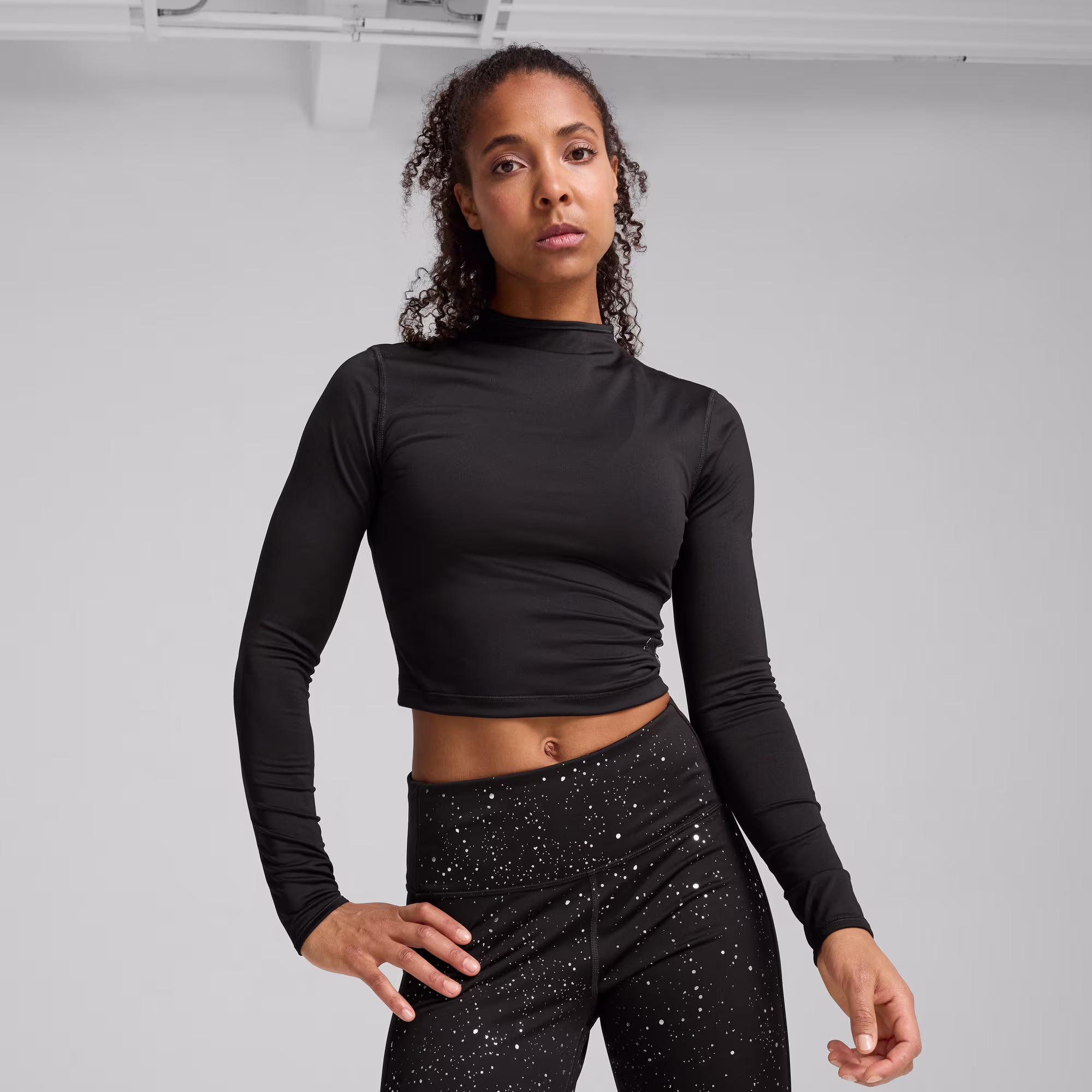 INTERGALACTIC-Long-Sleeve-Crop-Top-Women تاپ زنانه آستین دار پوما INTERGALACTIC Long Sleeve Crop Top - Image 1